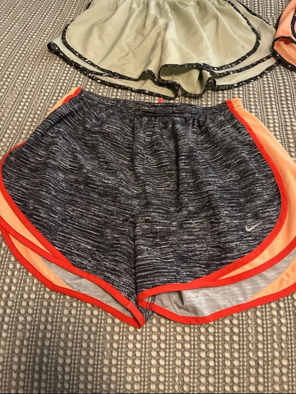 Bundle of 4 Nike women’s running shorts size Large LIKE NEW